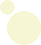 Two yellow circles of different sizes rest on a green background, reminiscent of the precision and balance found in the work of residential remodeling experts.
