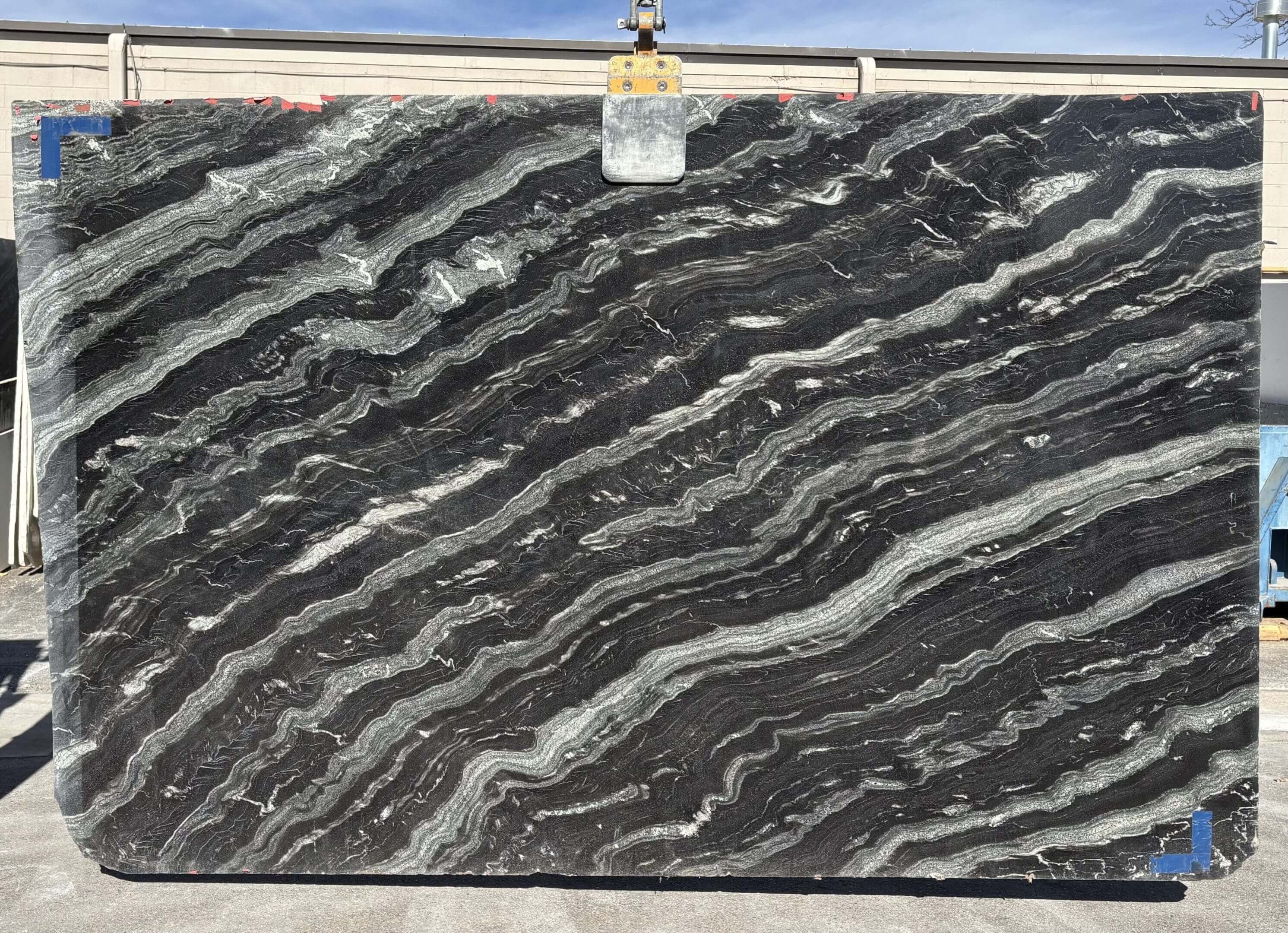 Black and white marble slab with patterns.