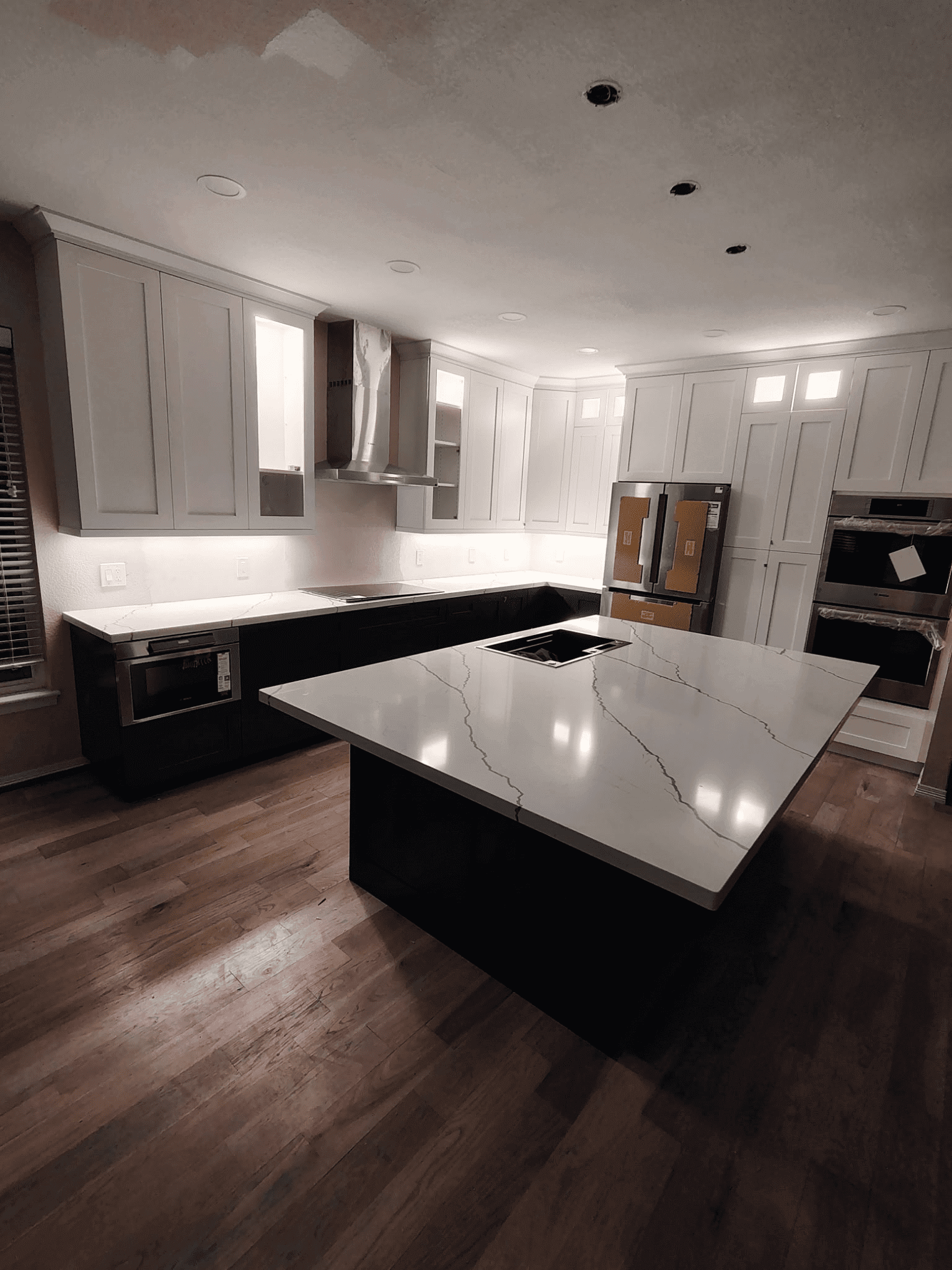 Modern kitchen with large island countertop.